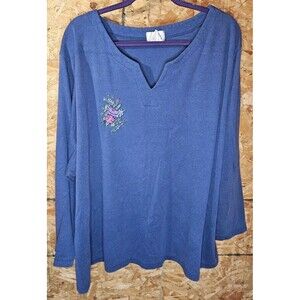 Roaman's V-neck Womans Top with Floral Accent. Blue. 5x